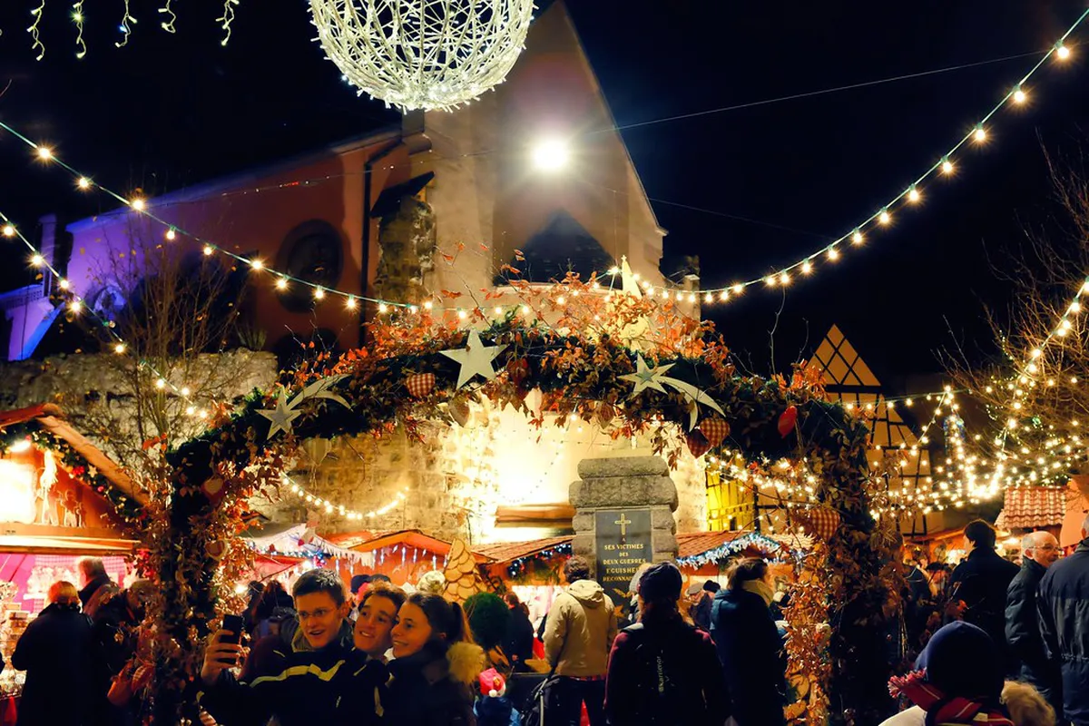 Eguisheim circular village square decorated for Christmas with traditional Alsatian architecture
