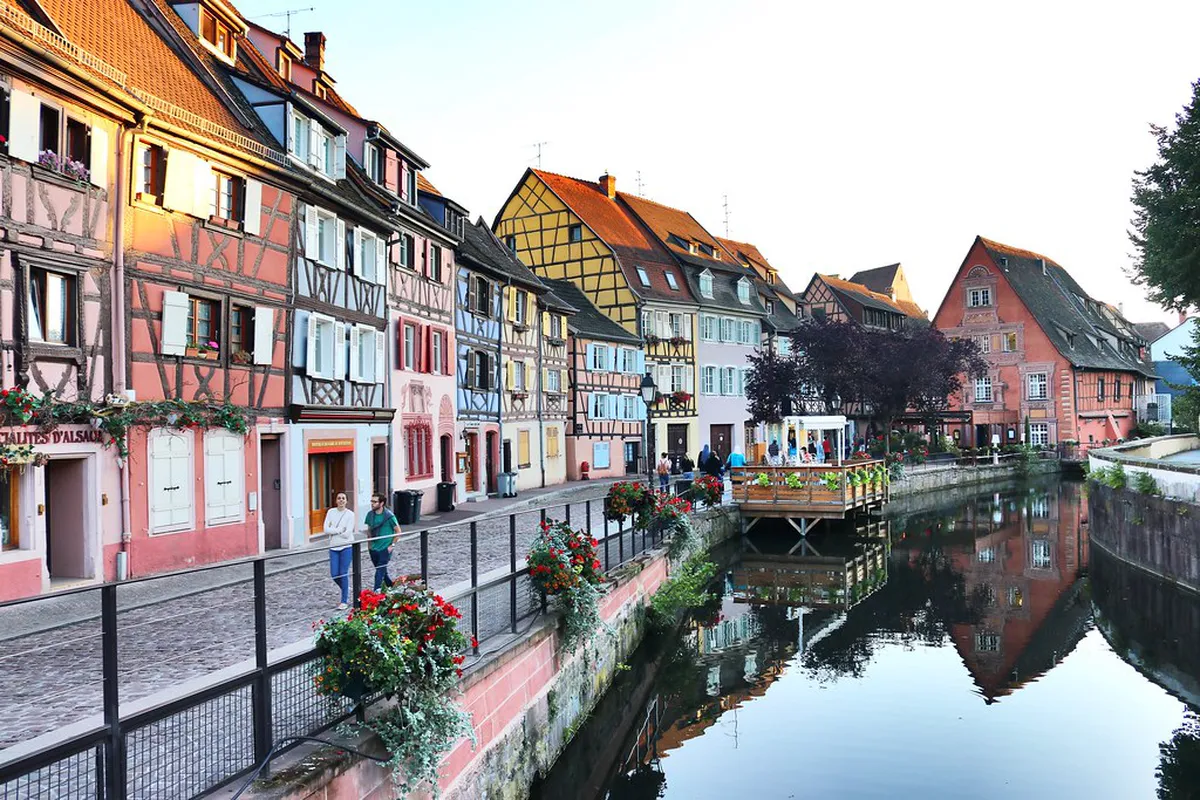 Pastel half-timbered houses lining the River Lauch in La Petite Venise, Colmar