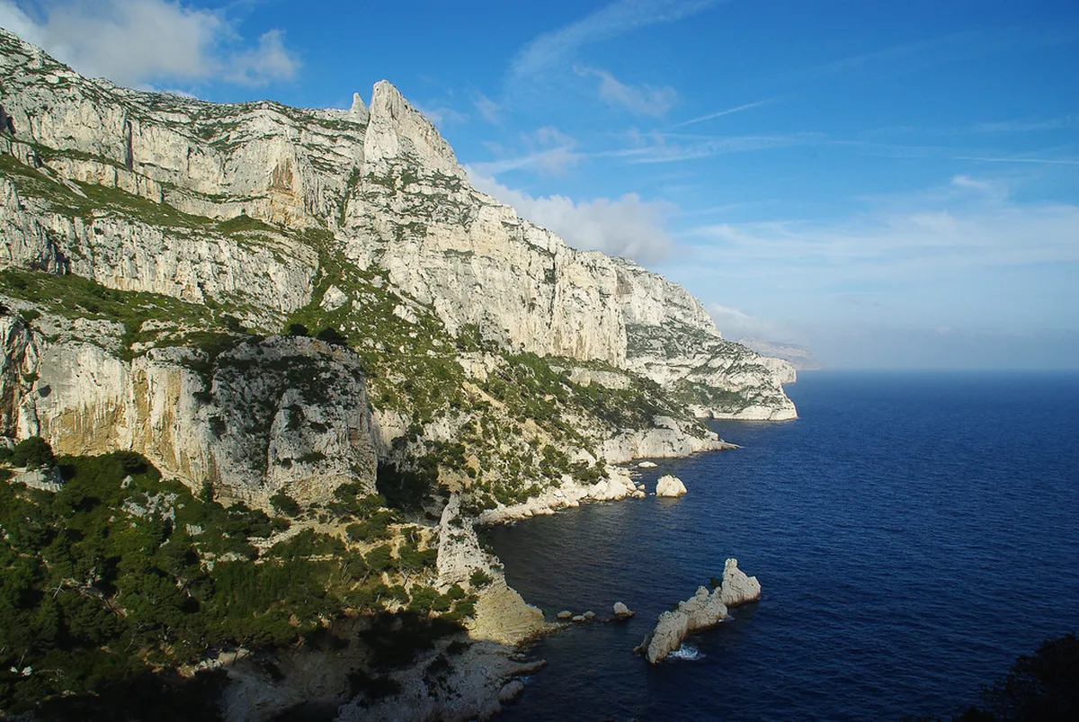 Sugiton calanque white limestone cliffs turquoise water Marseille