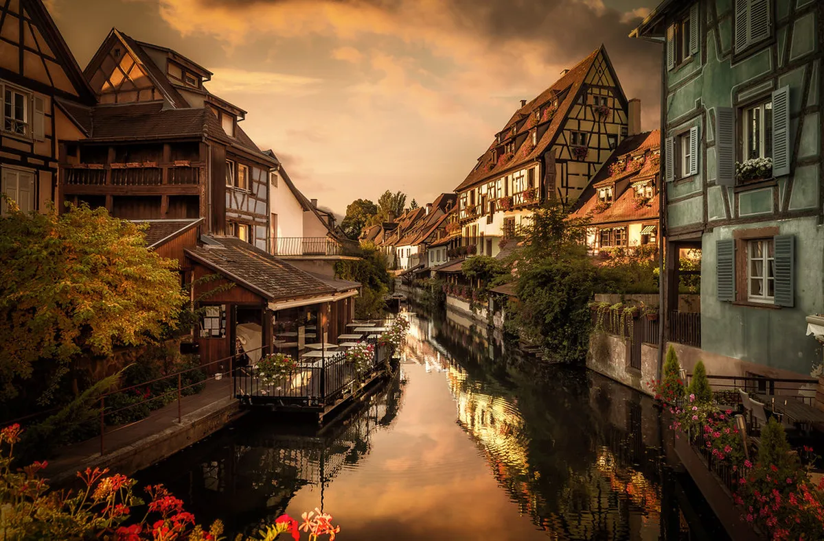 Colmar historic old town street with colorful buildings and narrow passageways