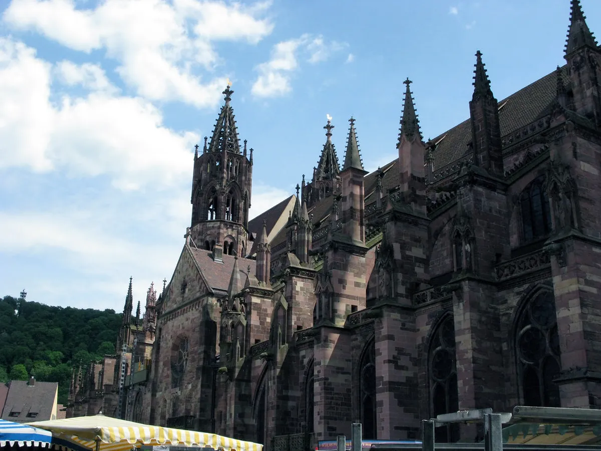 Freiburg Münster cathedral spire over historic old town buildings