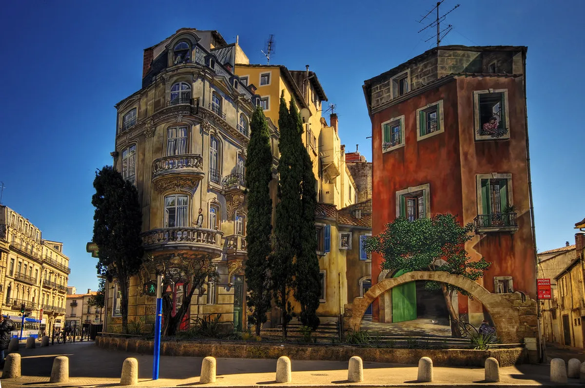 Montpellier riverbank district with street art and contemporary architecture along the Lez river