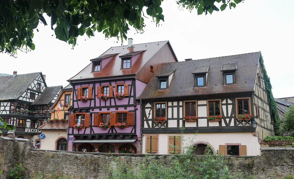 Kaysersberg traditional Alsatian half-timbered building with flower boxes