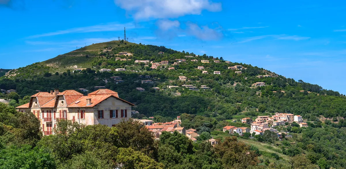 French countryside road through Provence with rental car driving toward Marseille
