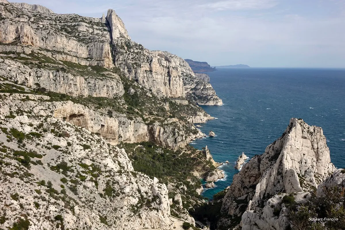 Calanque de Sugiton dramatic limestone cliffs and turquoise water near Marseille