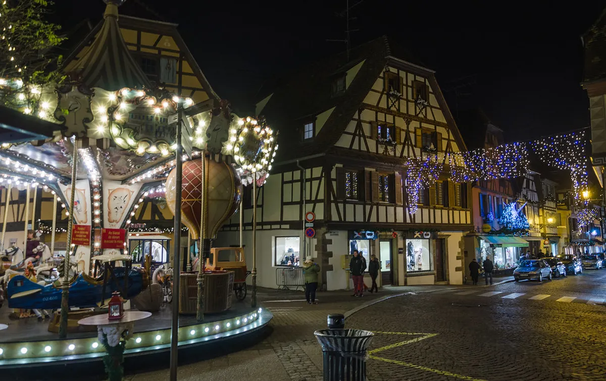 Obernai market square with half-timbered houses and Gothic belfry, Alsace France