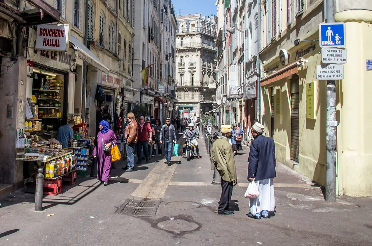 Stalls at a bustling open-air market in Marseille
