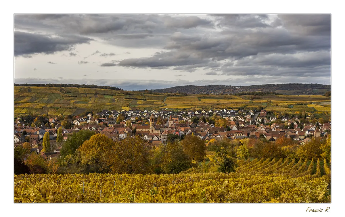 Charming Alsatian wine route village with traditional architecture in the Colmar region